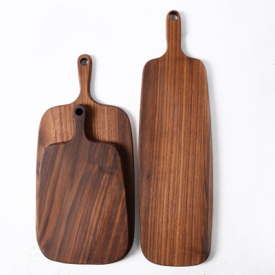 2017 wholesale OEM food grade black walnut paddle cutting board